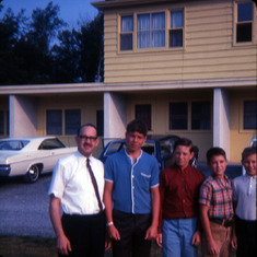 John A & the boys in front of a motel Aug 67