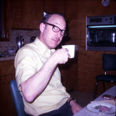 John A at kitchen table having coffee July 69