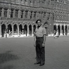 John Anstett standing in parade square Europe 1945 lr