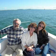 John, Alison, and Katie on the boat at Cape Lookout, NC (2011)