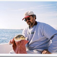John with a pufferfish. He always had a knack for getting picked on by bait stealers.