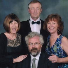 John with his wife (Alison), brother (Hector), and sister-in-law (Sheena) in photo taken on a cruise