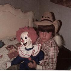 John in his room with bozo the clown
