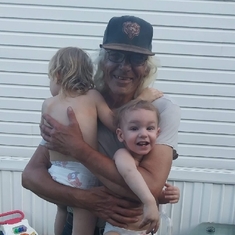 John Son and 2 of his grand kids,  Liam and Zane Son at Adam Sons home in Warren Michigan approximately August 2018.