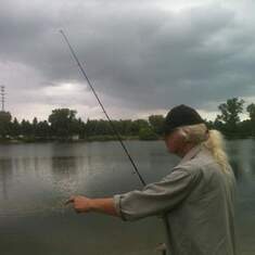 John Son fishing with Adam Son at Sylvan Glenn Park, 
Troy Michigan. approx 2012
