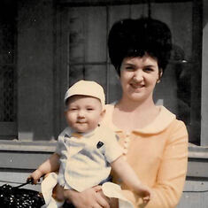 Janis with John as a baby.