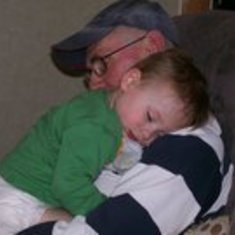 here is a pic of my dad and my little boy ry (chunky) catchin a nap 2gether.