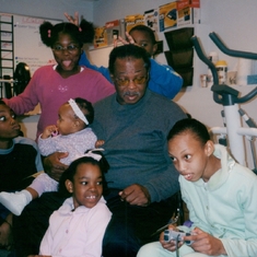Grandpa and all of his grandchildren.