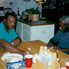 John & his late younger brother, Cornel Simpson in Atlanta playing dominoes.
