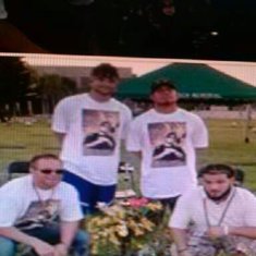 1410739779652 Max Gross , stefan, Trevor and John's lil Bro Jeremiah ( Polo) protectively encircled around John's long awaited Headstone, Flying Rip John Strassburg white T's with his now iconic pic with slogan " When John Laughed, the Whole World Laughed