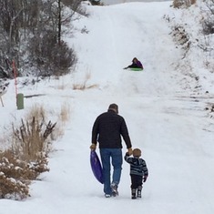 Grandpa and Jace going sledding - Christmas 2014