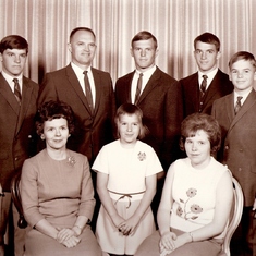 Front: Marjorie (wife) Julie and Marilyn
Back: Roger, John (husband) Gary, Bruce and Ken