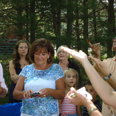 John's sister Shelly during the butterfly release at John's Memorial Service in Morristown, IN