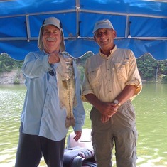 Dad and John...hot 90 degree summer day and we still caught fish.  I'll always cherish the last time I got to fish with him and it was a pleasure being his guide.