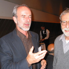 Beau Watson instructing John on the finer things in life at the Tillyer Award banquet, 2004