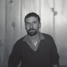 Dad's first flirtation with facial hair ended with shaving off the mustache, in September 1964. This was taken in our living room in Bethesda.