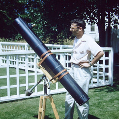 Re-upload of this picture of Dad with his telescope. (The first was flipped backwards.) He built this telescope and ground the lens in the living room of our apartment in Providence, which would be c. 1956-59. Does anyone recognize the location?