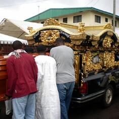 Loading casket into the hearse