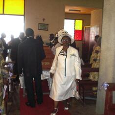 Mama in front of the casket
