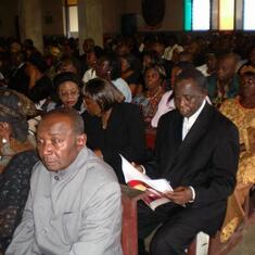 Mourners at funeral service