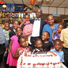 With his grandchildren at the 70th birthday celebration.