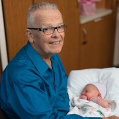 John and his newborn granddaughter Emily