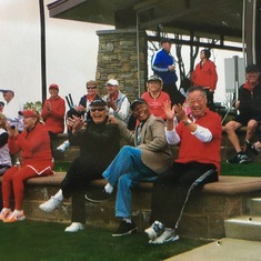 John watching a tennis match with his friends Jim Walker in Sun City.