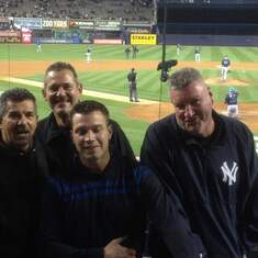 John & I once cleared out a whole row at Yankee Stadium and sat alone the entire game .