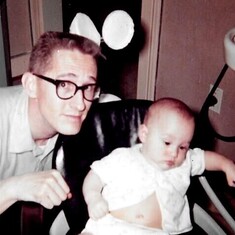 Infant John in dental chair with Dad