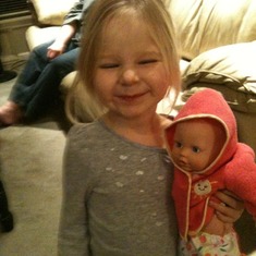 The dolly John helped Katie dress.  Such a patient uncle!