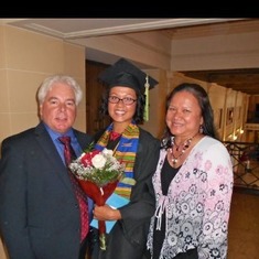 Mike and Melody McC with Mel's beautiful daughter upon graduation.