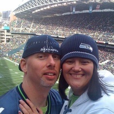 Nephew Jeremiah and his wife, Tiffany, ever the Seahawk fans.