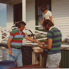 John, Jimi and Steve shucking scallops