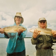 PaPa John and Son Jeff caught fish.