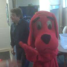 Clifford the Big Red Dog, originally purchased for Little Professor's appearances, walks the stage again, under John's direction, at West Elementary