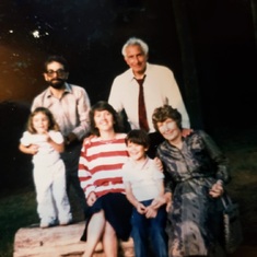 Key mentor Stan Oshinski, wife Iris and daughter Robin with John and children