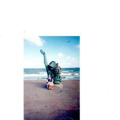 GREG AND AMY IN GALVESTON ABOUT 10 YEARS AGO....HE LOVED THE OCEAN AND THIS STATUE