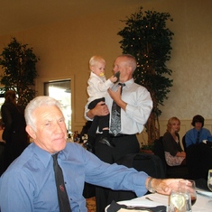 John at a family wedding in 2010.  Nephew Adam Pence holding Great nephew Wade Nelson with Great Niece Anna Pence, and Great nephews Kane and Riley Nelson in background.