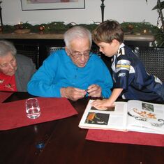 John giving a biology lesson to great-grandson Jake, 2005
