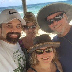 With my brother John and wife Lori at Naked Beach on Cozumel Island.