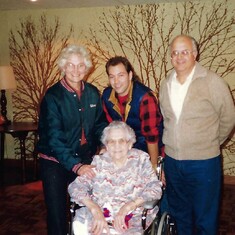 Jonathon with his folks and Grandma Kramer.