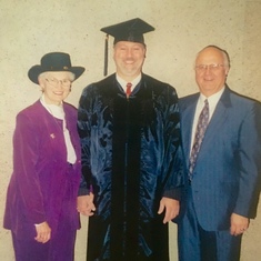 Jonathon and Mom/Dad at his doctoral graduation