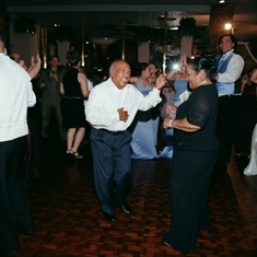 Pops and Mom doing what he loved... dancing at my Wedding.