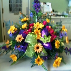 His father's day flowers I put for him at the cemetery because he loved bright colors.