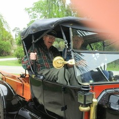 Dad a few months before his death, getting a ride in my cousin's Model T. Loved that grin!