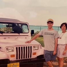 With mom and the awesome pink jeep