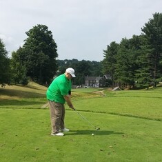 Joe, driving the 18th hole at Bella Vista golf course, also playing were Yacoob and I
