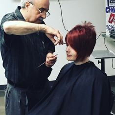Zio teaching the students at the Paul Mitchell School