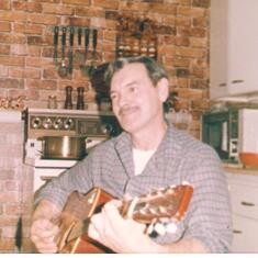 Dad playing the guitar 001