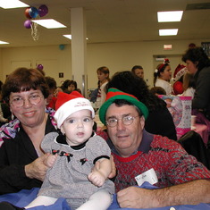 Grandma and Grandpa with Serafina first Christmas